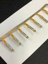 Load image into Gallery viewer, 66104-1 -25 - AMP - Socket Contact Gold or PdNi +Gold Crimp 20-24 AWG Stamped, Chain Form, 25 contacts per package. Quantity Shown Available = 25 Packs.

