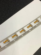 Load image into Gallery viewer, 61513-1 -50 - AMP - CONN TERM RCPT FLAG 22-26AWG, Chain Form, 50 contacts per package. Quantity Shown Available = 50 Packs.
